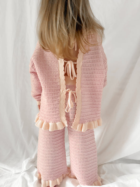Unique, beautiful girls pink jumper with tie back detail. Matching trousers. Matching outfit